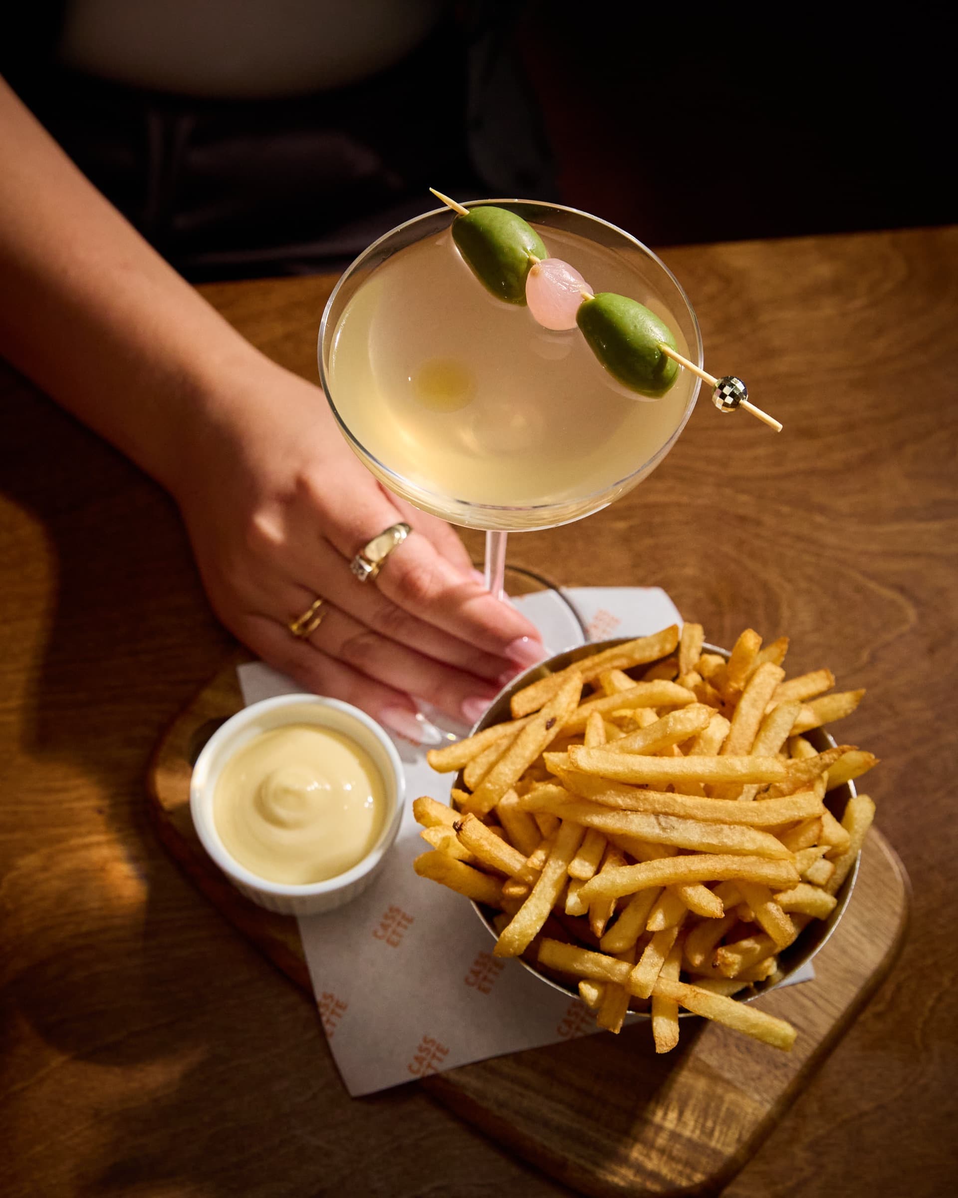 A martini and a basket of fries at Cassette