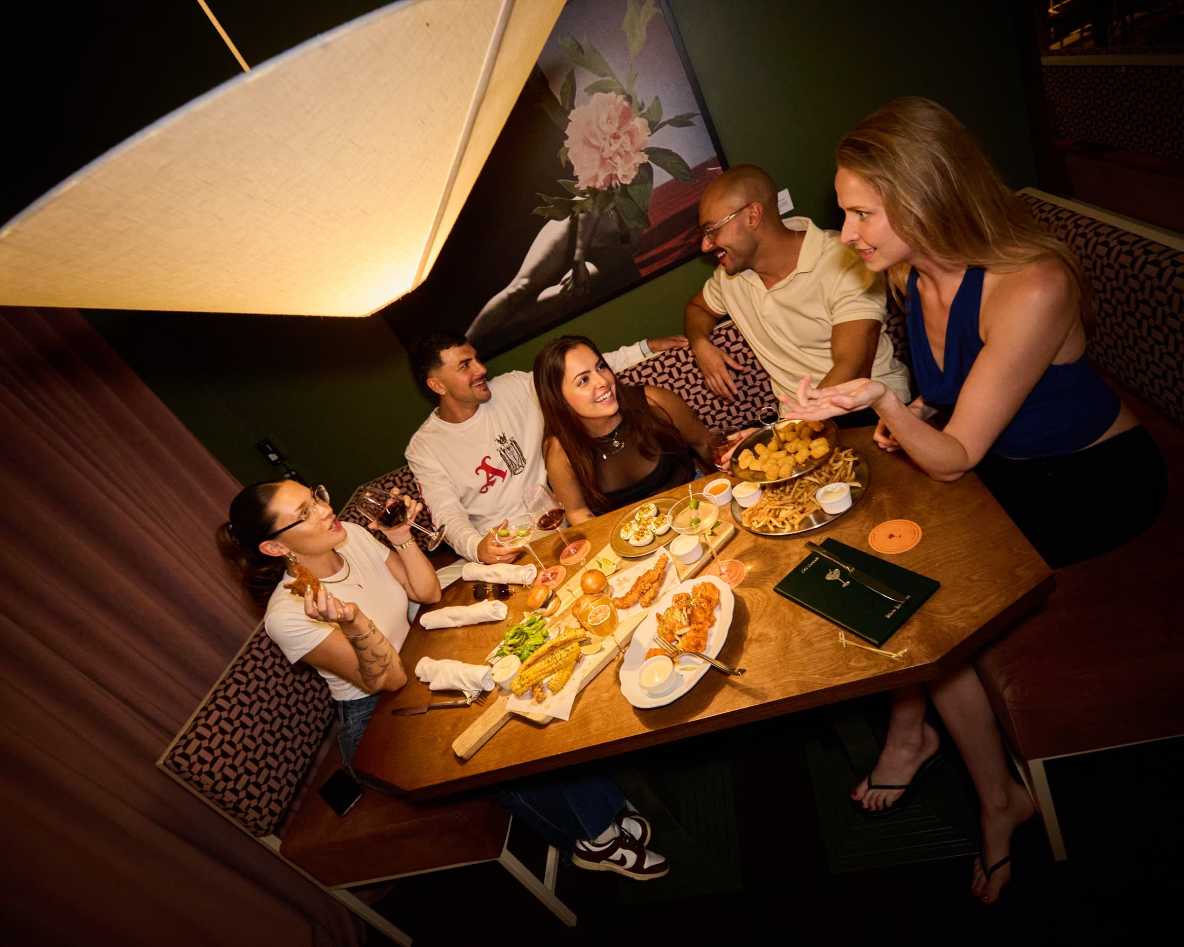 Guests at a table in Cassette's main dining room
